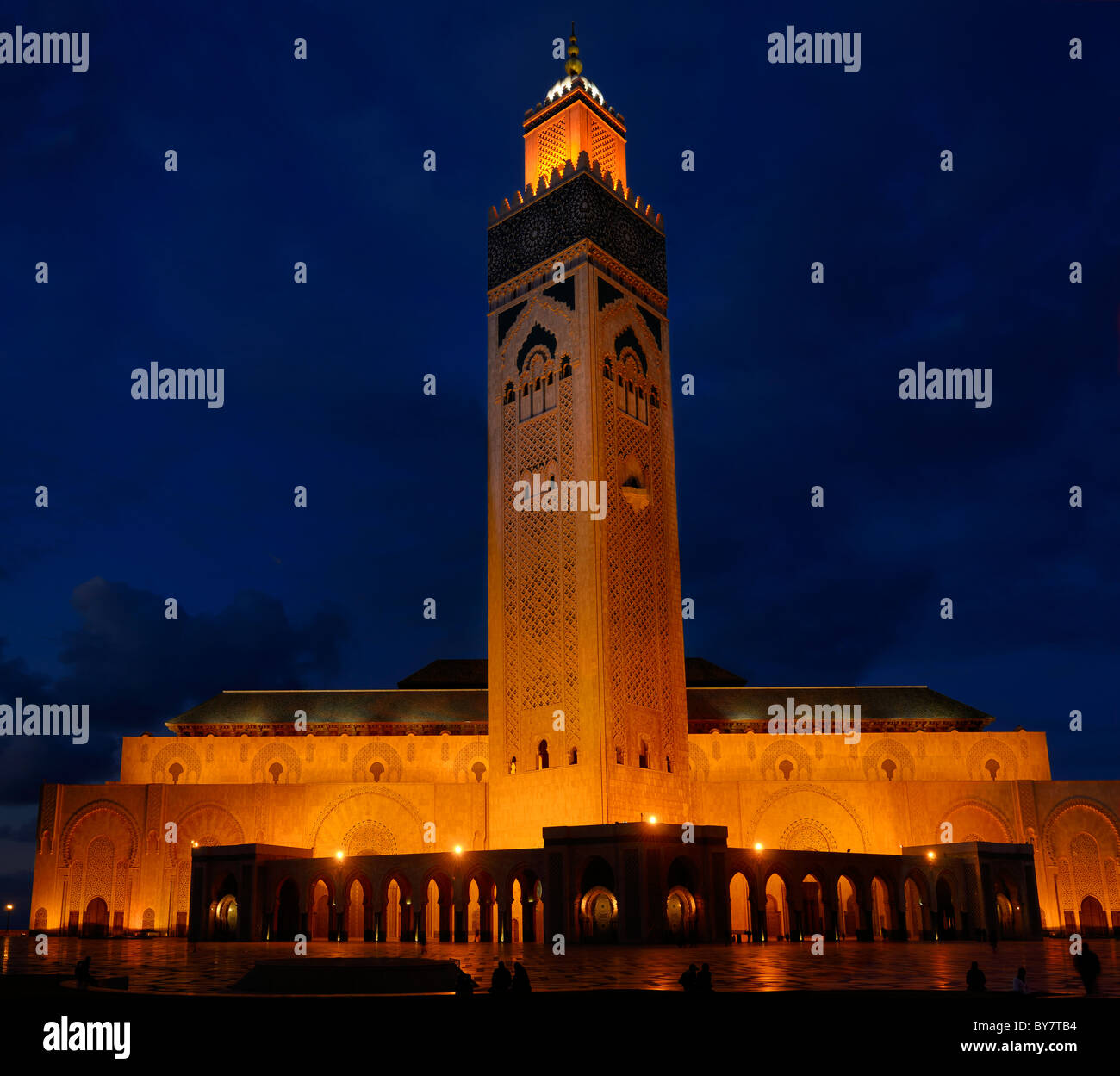 Golden lights on Hassan II Mosque and minaret at night in Casablanca Morocco Stock Photo