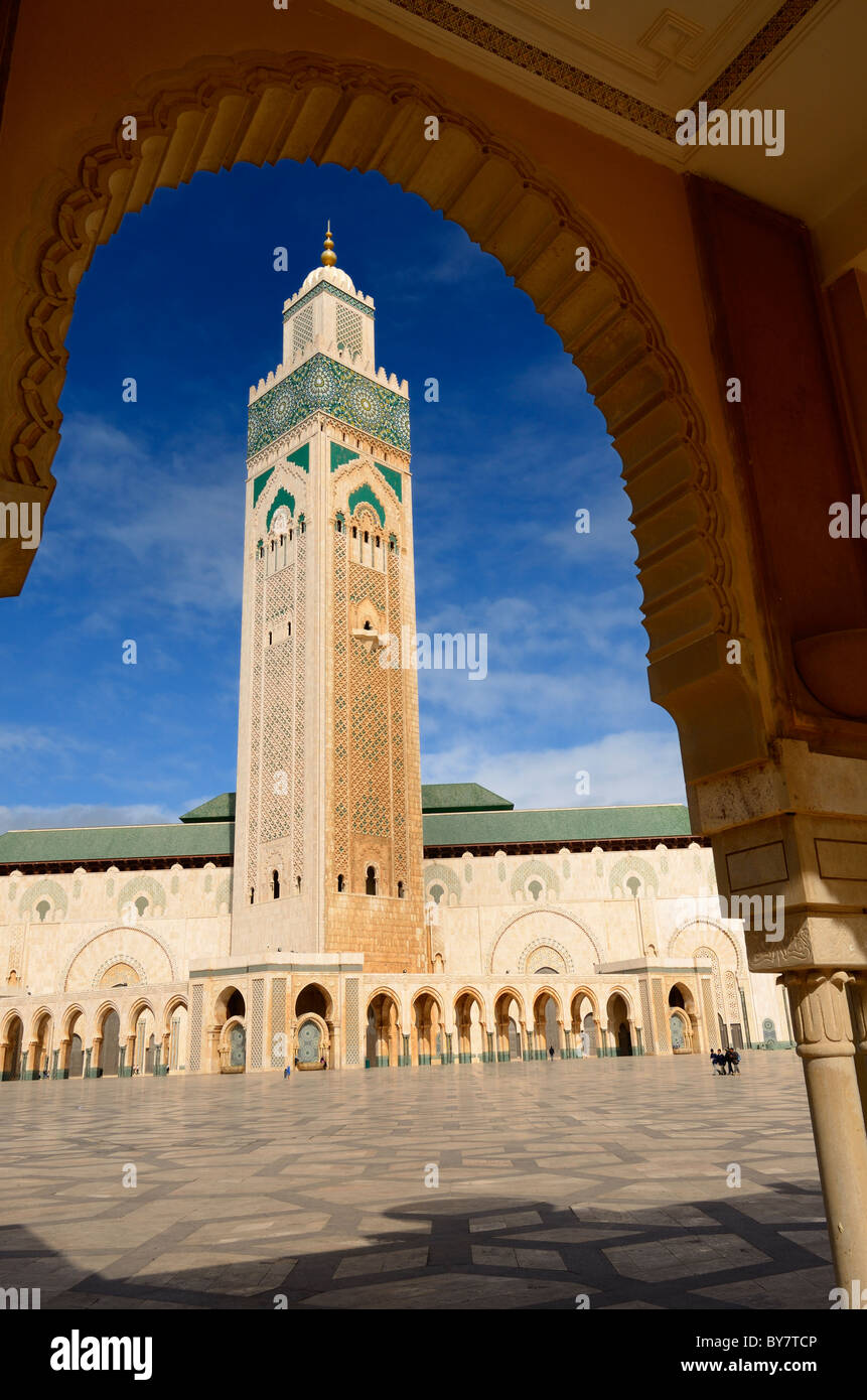 Hassan II mosque minaret framed by a plaza arch in Casablanca Morocco Stock Photo