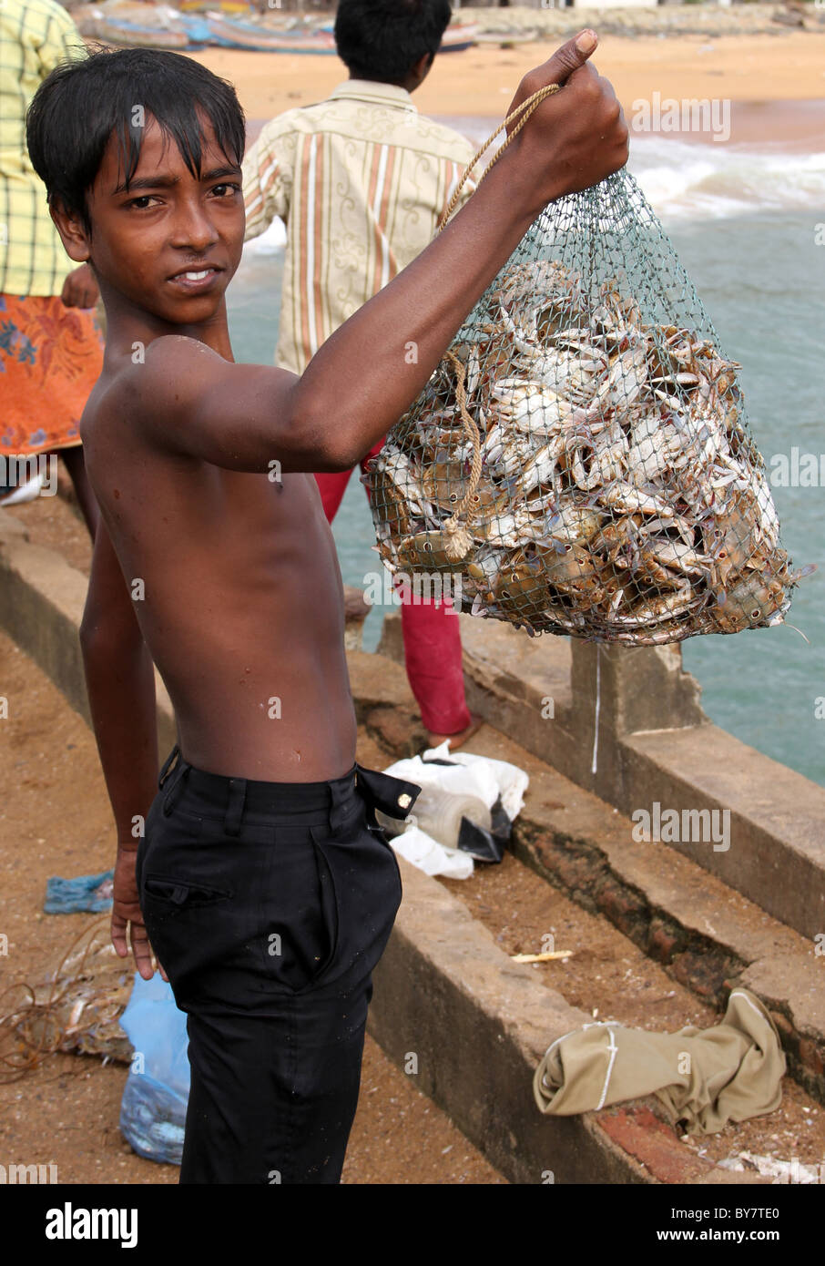 fisherman with crabs Stock Photo