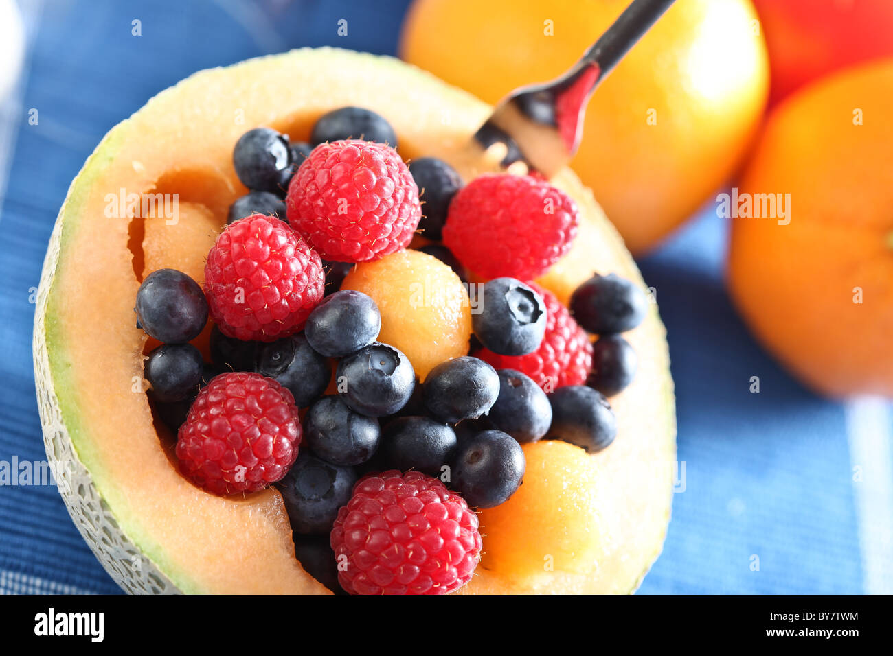 Mixed fruits inside cantaloupe bowl Stock Photo Alamy