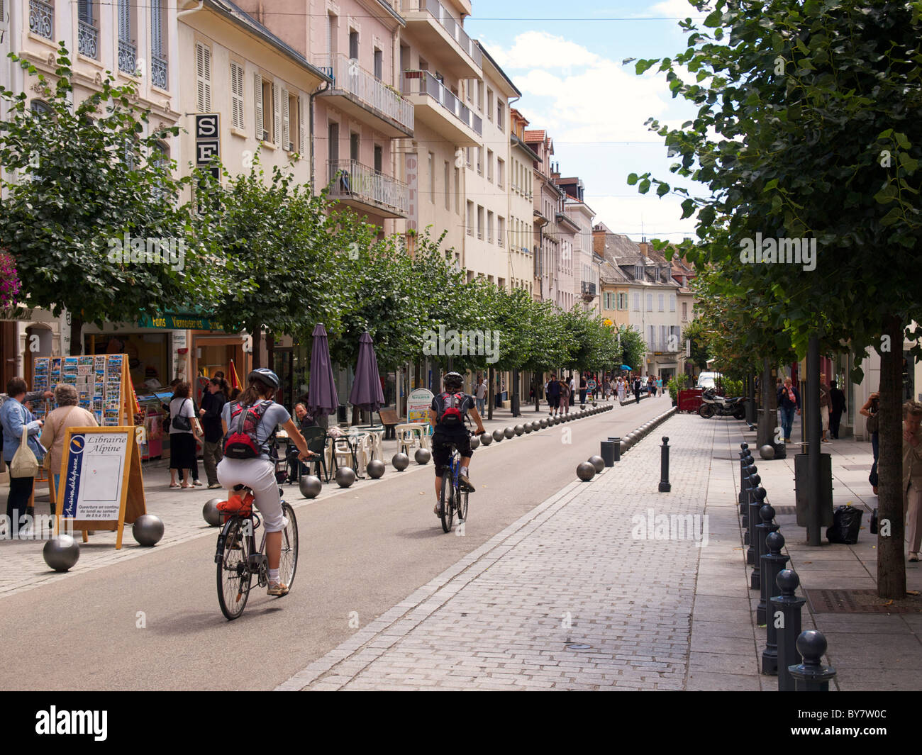 Bicyclists on the street in Gap, French Alps, France Stock Photo
