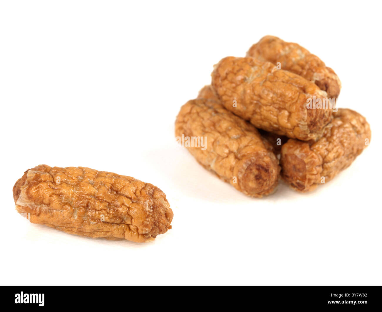 Fresh Party Food Small Pork Cocktail Sausages Finger Food Or Snacks Isolated Against A White Background With A Clipping Path And No People Stock Photo
