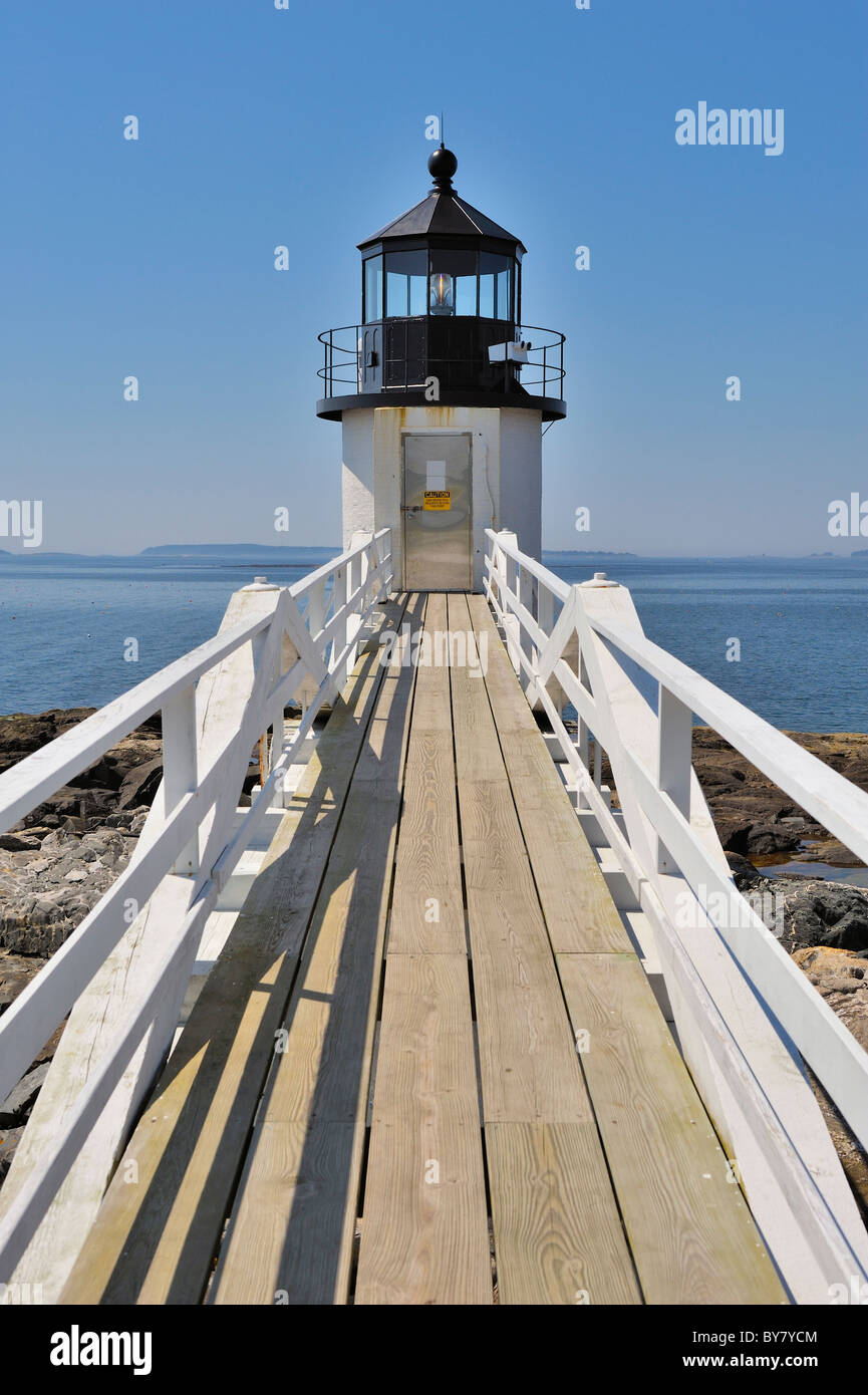 Wide-angle vertical view of Marshall Point Lighthouse looking toward Penobscot Bay, Port Clyde, St. George Peninsula, Maine, USA Stock Photo