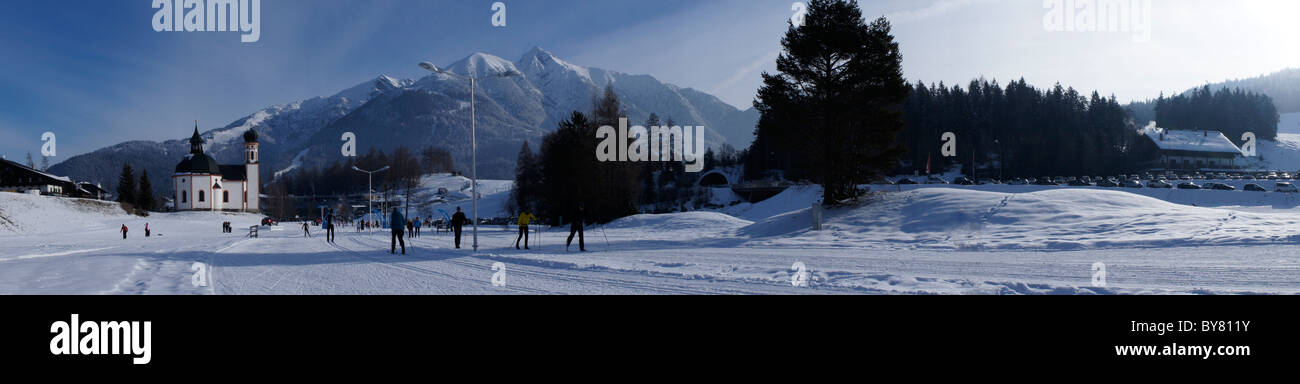 Seefeld, Tirol, Austria, Winter, Lake Chapel, Crosscountry tracks, in back skiarea Rosshuette. Stock Photo