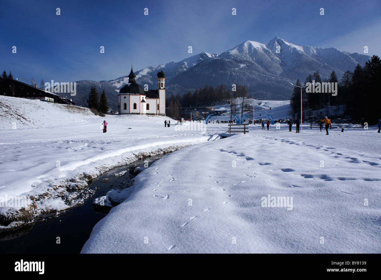 Seefeld, Tirol, winter, Lake Chapel, Austria in back skiarea Rosshütte Stock Photo