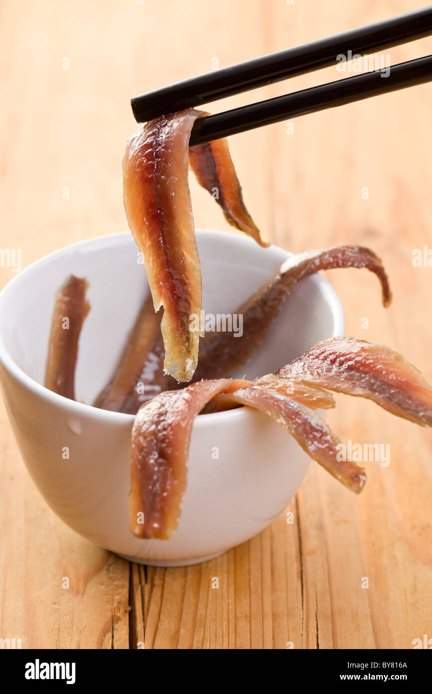 anchovies fillets in bowl Stock Photo