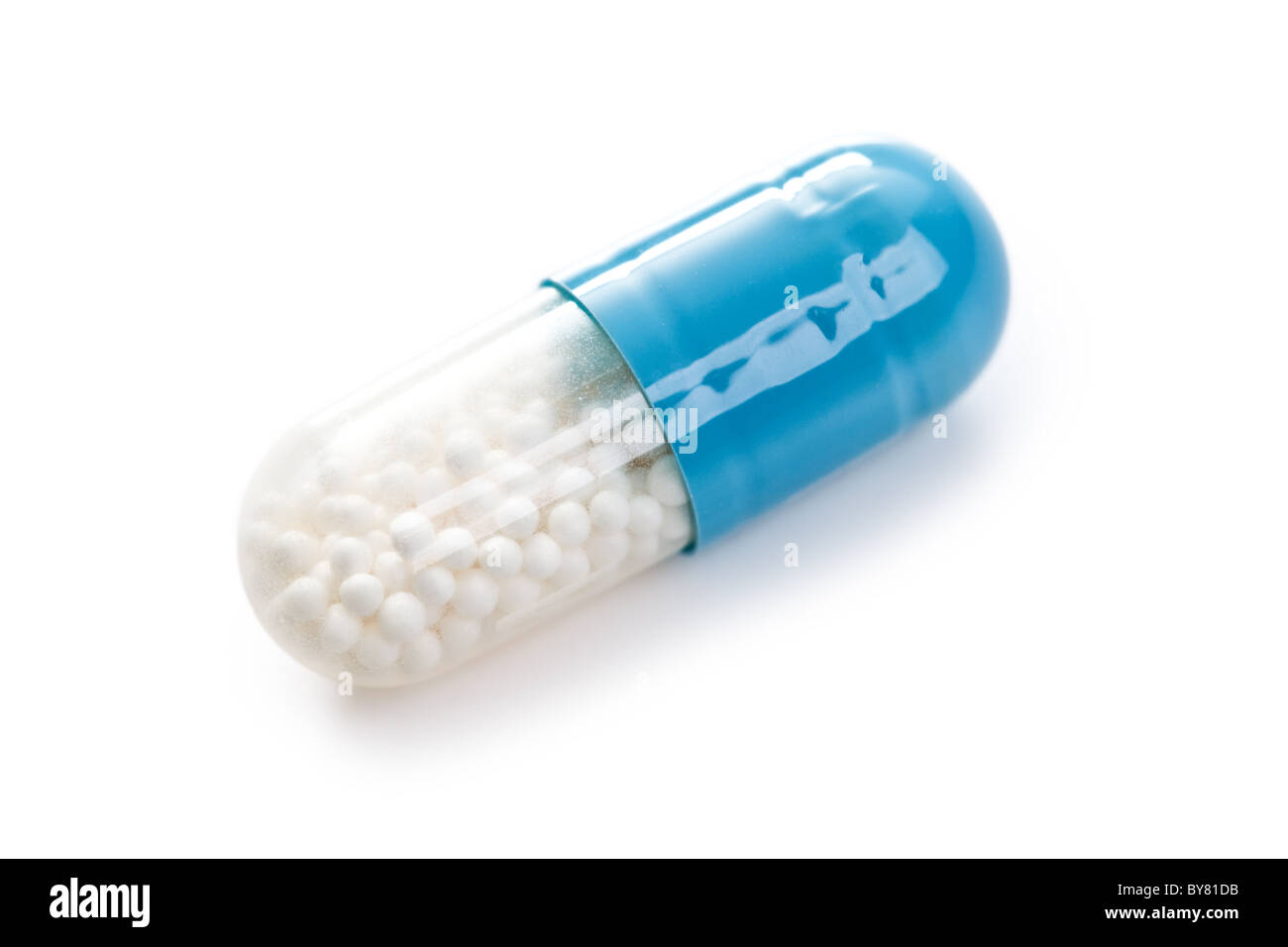 blue medical capsules on white background Stock Photo