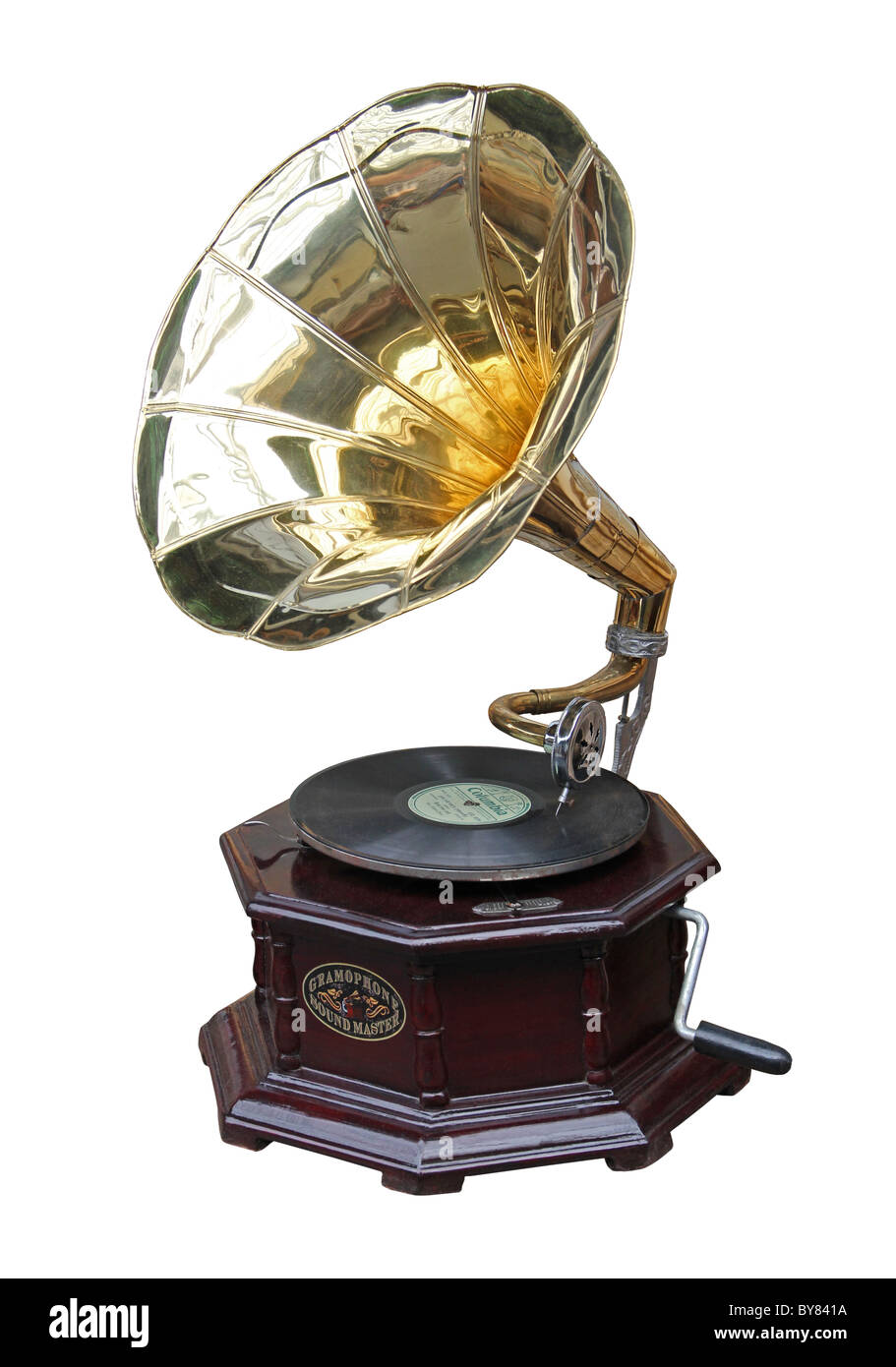 An old brass horn gramophone and record. Stock Photo