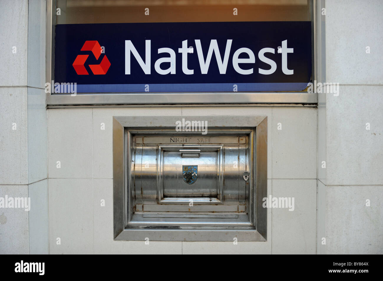 NatWest bank sign and night safe UK Stock Photo