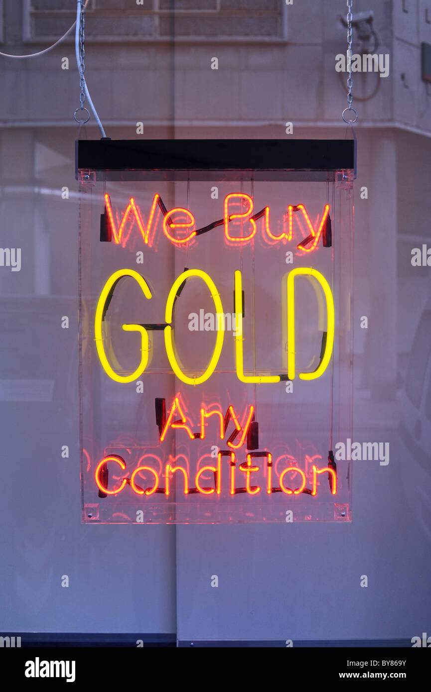 We Buy Gold Any Condition neon shop sign Brighton UK Stock Photo