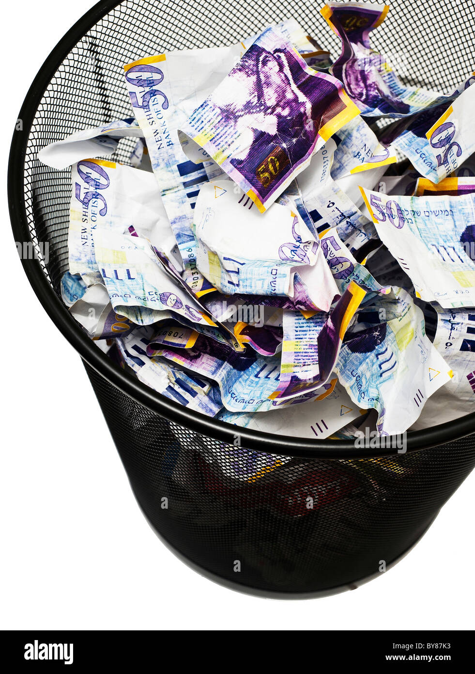 Banknotes in a waste paper basket On white Background Stock Photo