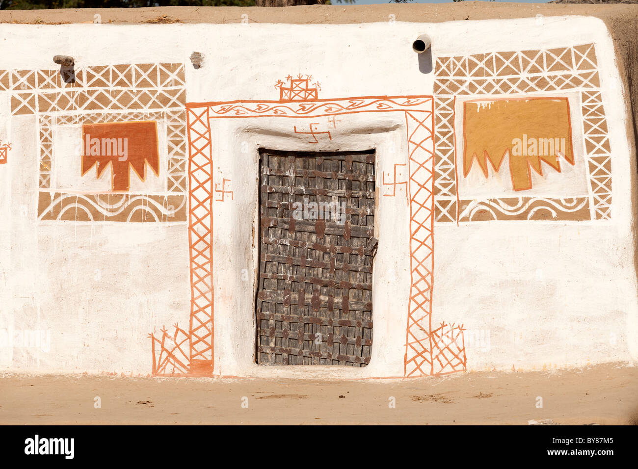 India, Rajasthan, Thar Desert, traditional village home painted walls Stock Photo