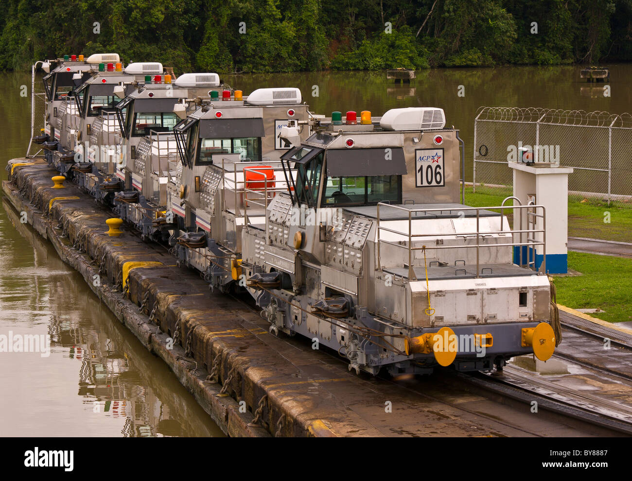 PANAMA - Electric locomotives, Miraflores Locks on Panama Canal. Stock Photo