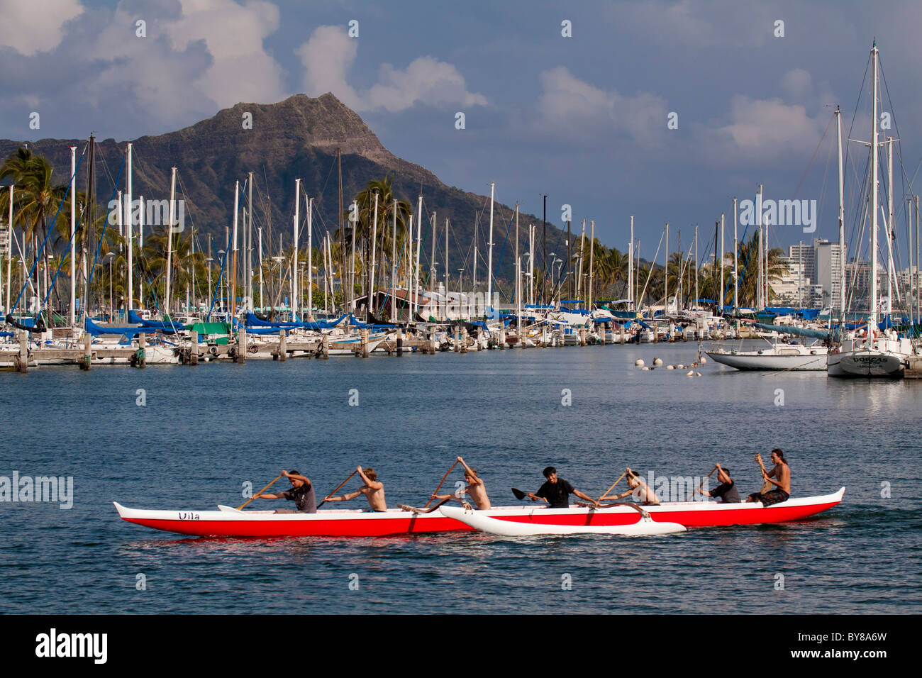 High school students practicing in outrigger canoesAla Moana Beach