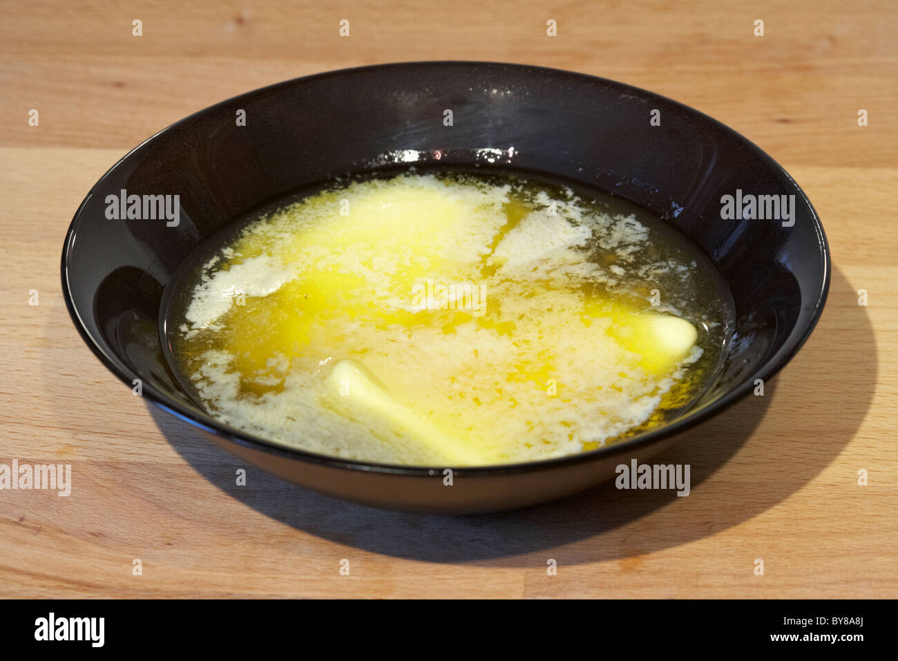 amount of melted butter used as an ingredient for baking Stock Photo