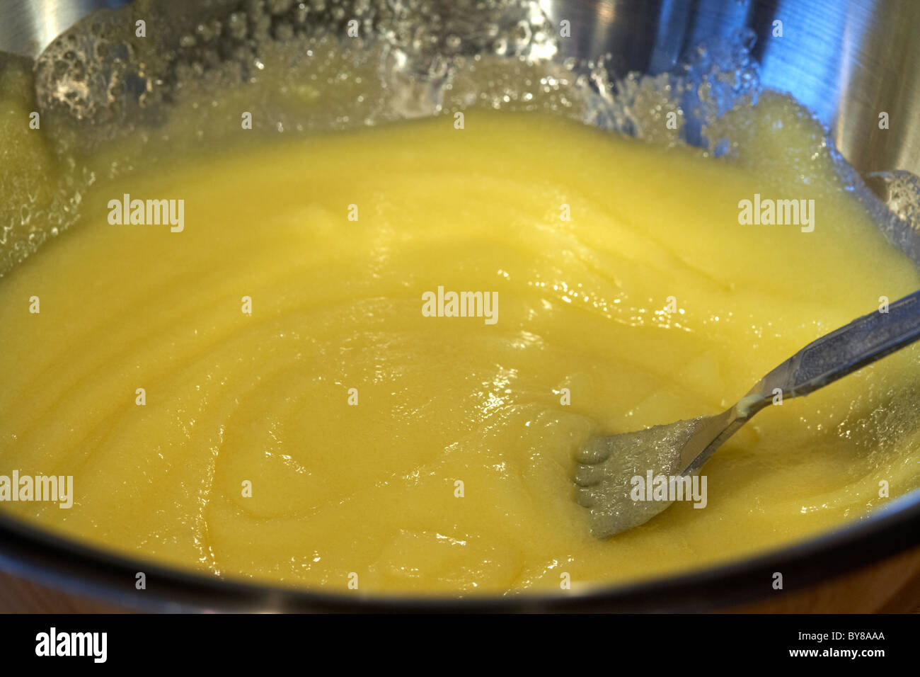 caster sugar and egg mixture creamed together for baking Stock Photo