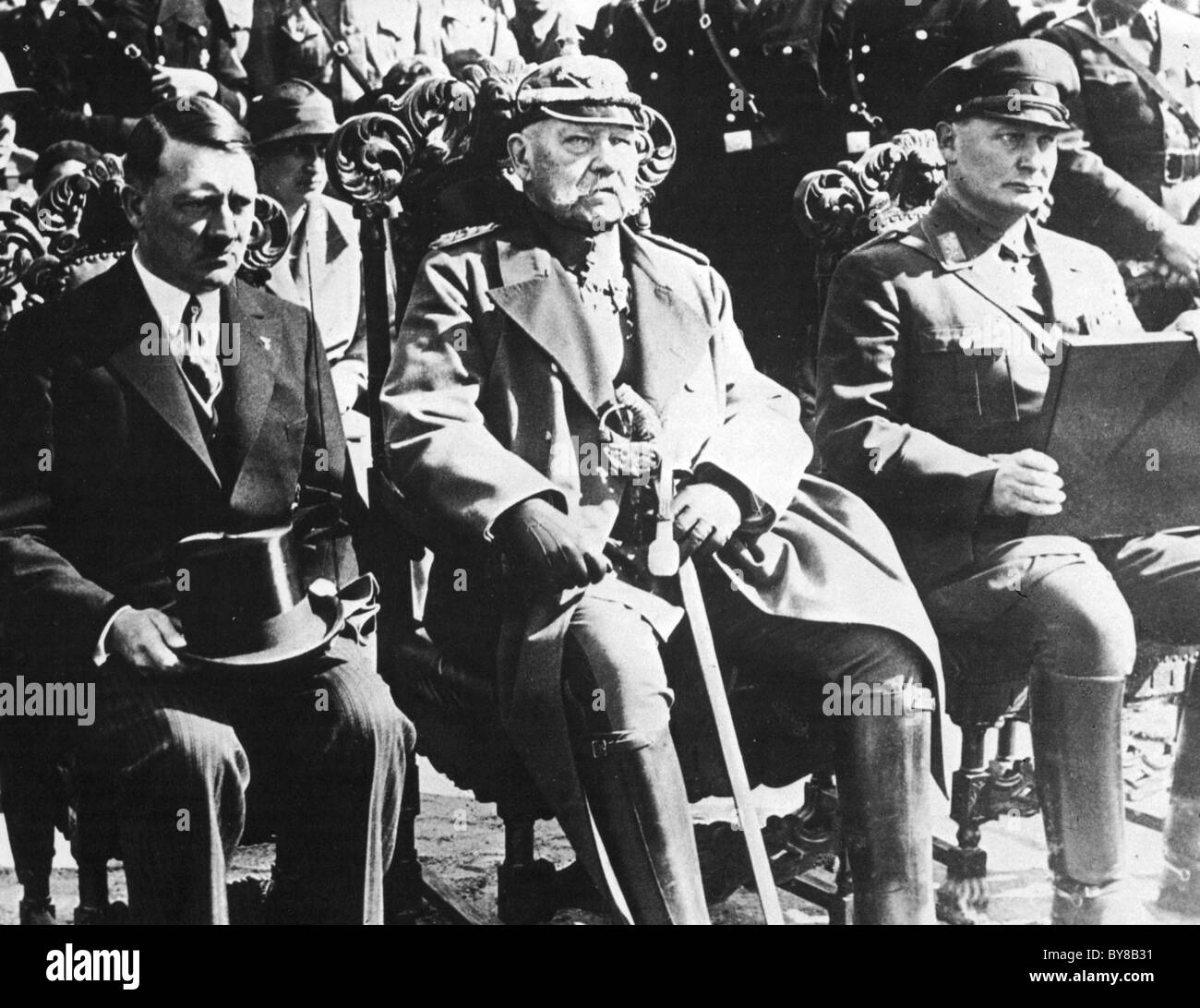 PRESIDENT PAUL von HINDENBERG centre with Hitler at left and Goering right during the Tannenberg Memorial Parade  in 1934 Stock Photo
