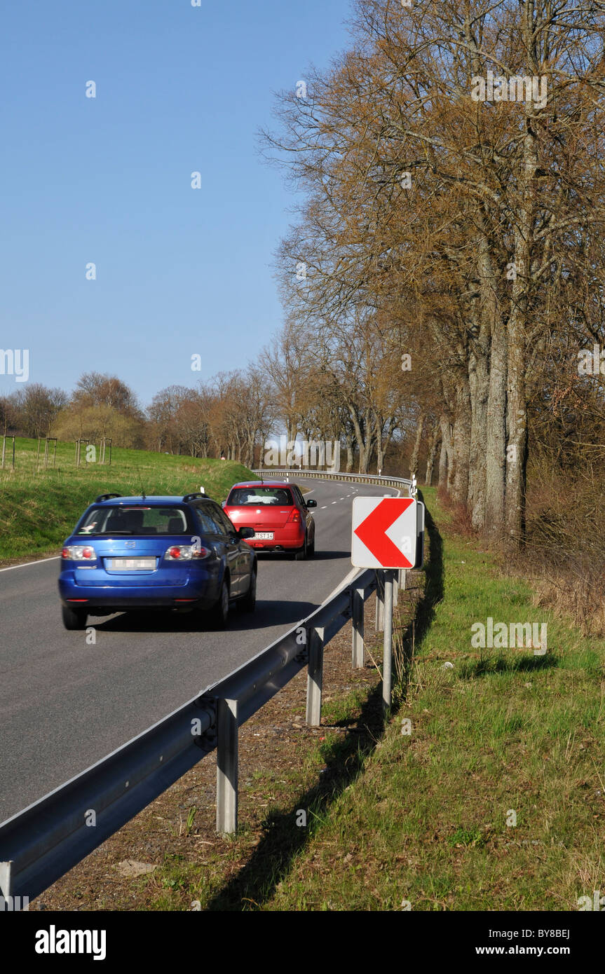 Rural Road with crash barrier and car, Eifel, Germany, Europe Stock Photo