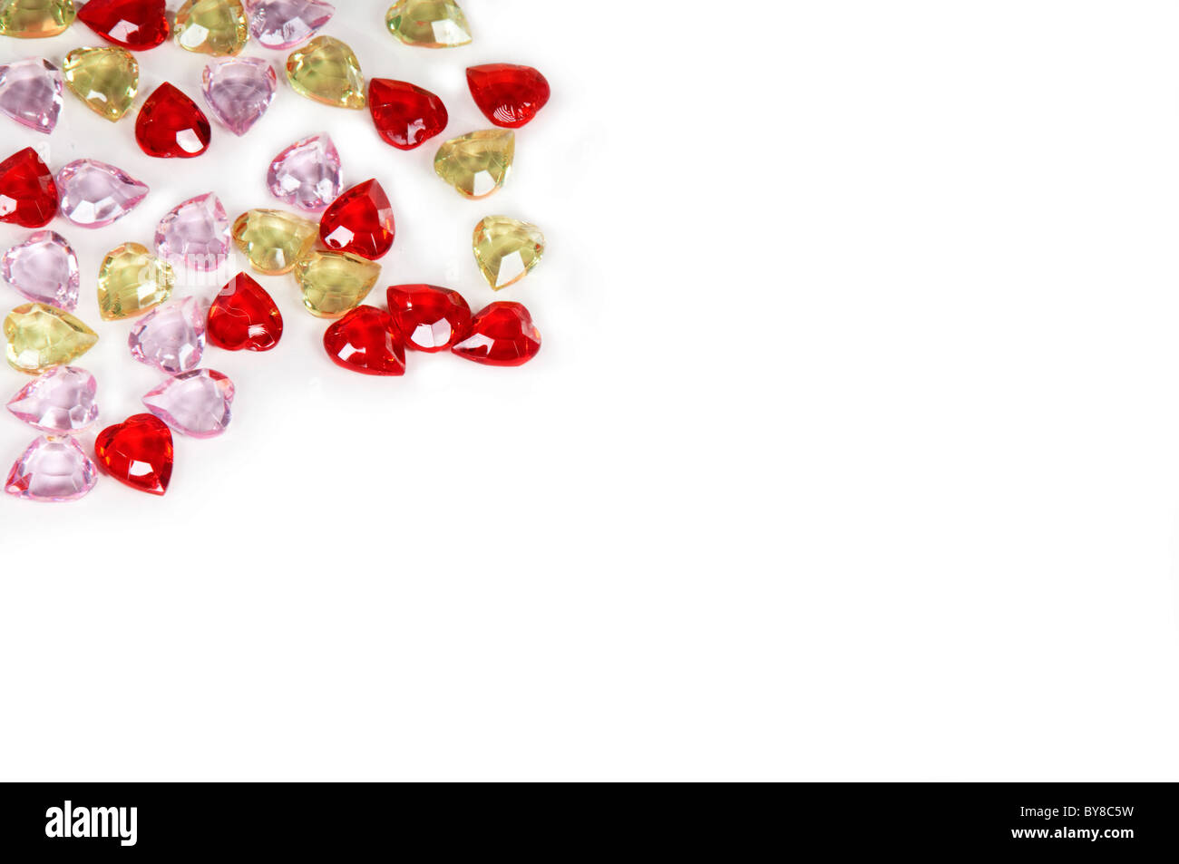 Colorful heart gems background Stock Photo - Alamy