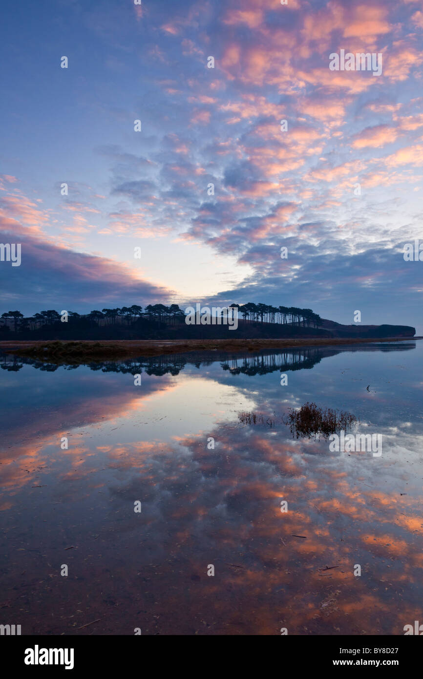 The River Otter at Budleigh Salterton at high tide just after sunrise Stock Photo