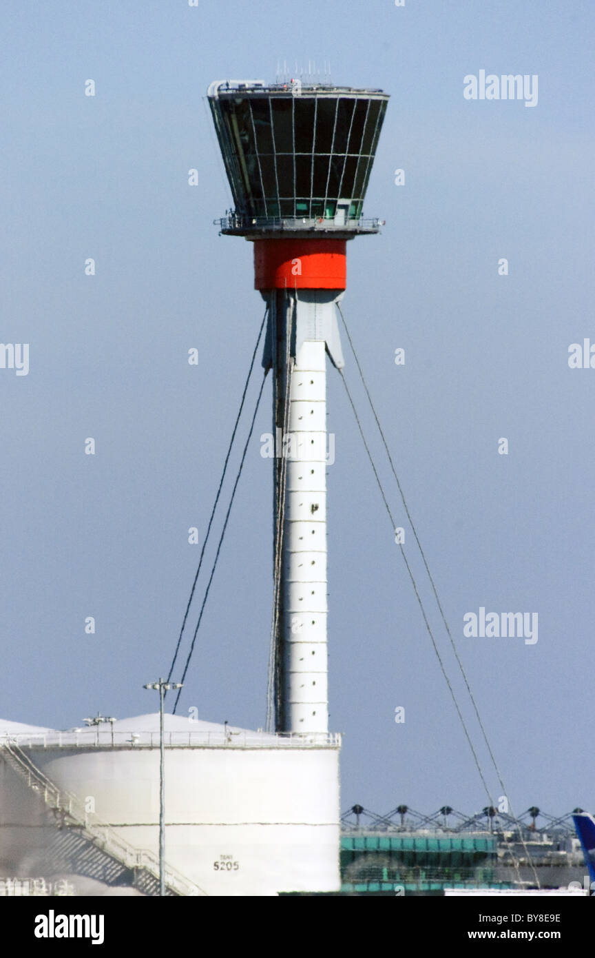 Heathrow Airport Control Tower. Aviation fuel tanks in foreground Stock  Photo - Alamy