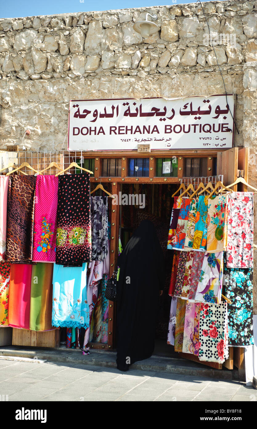 A shop selling textiles in Souq Waqif in Doha, in the state of Qatar Stock Photo Alamy