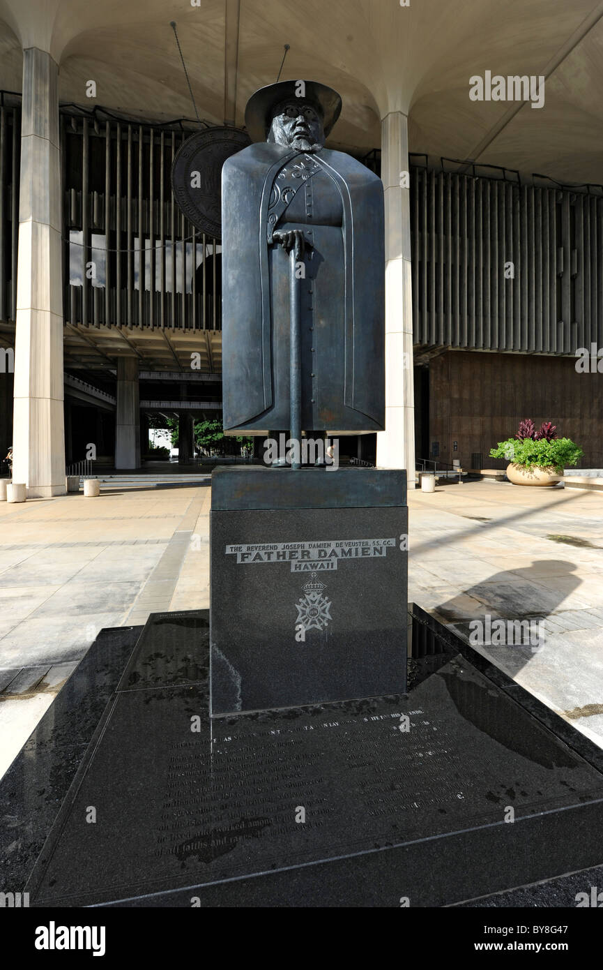 Statue of Father Damien in front of state capitol building Honolulu