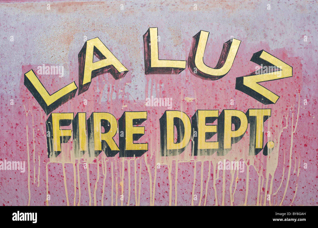 An old fire truck fades in the sun near La Luz, New Mexico. Stock Photo