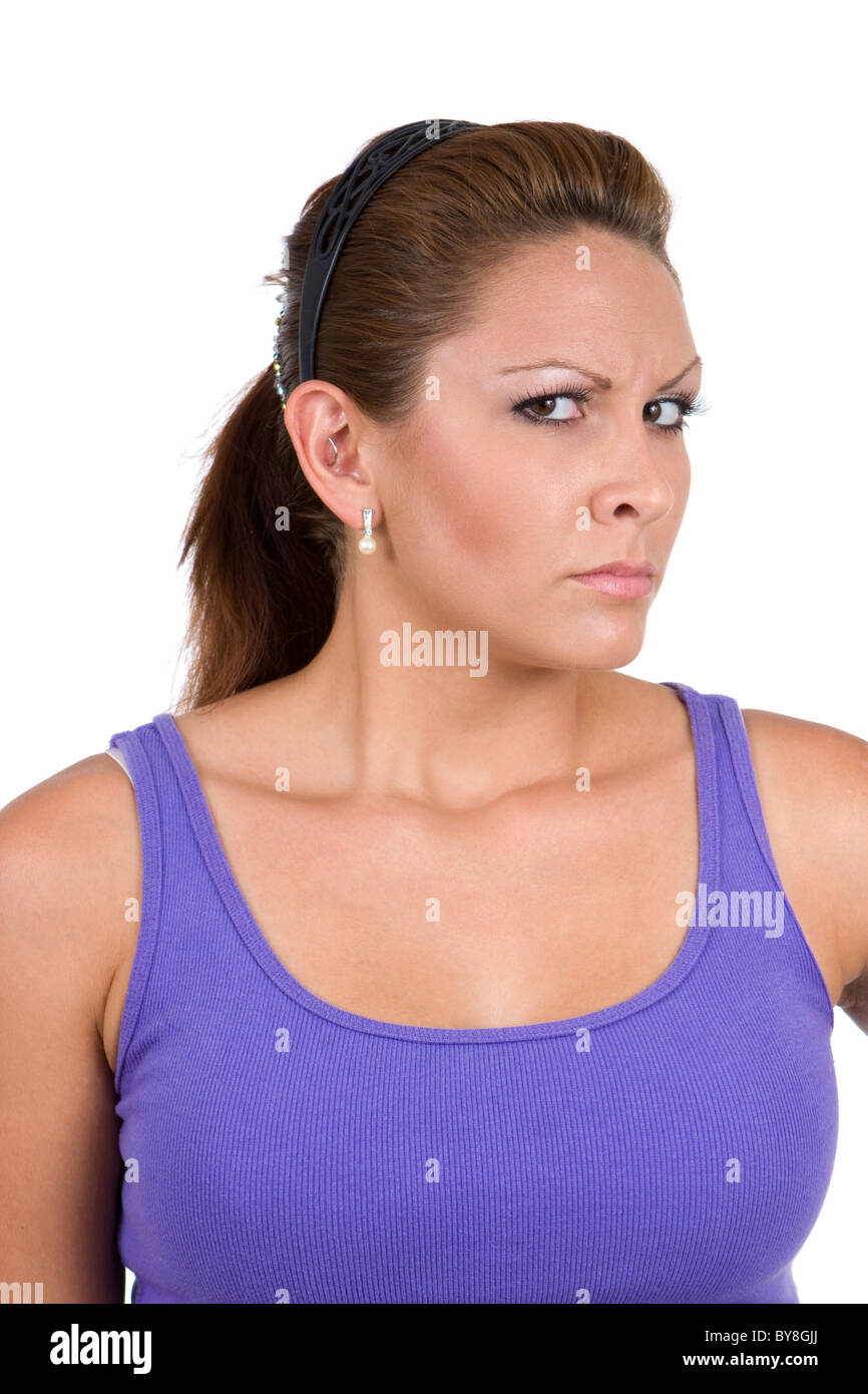 Woman watches with a suspecting gaze seeming not sure of the intentions. Stock Photo