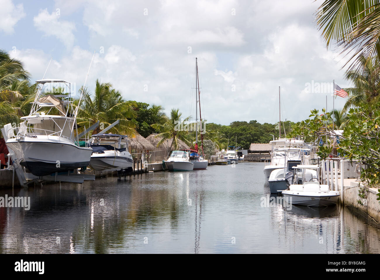 Pleasure boats line the canal in Key Largo, Florida. Stock Photo
