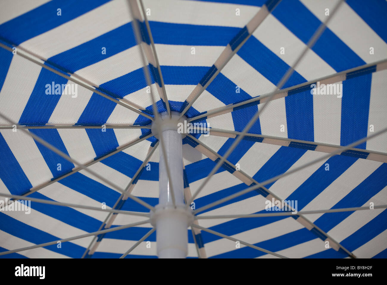 Detail of blue and white striped beach umbrella Stock Photo Alamy
