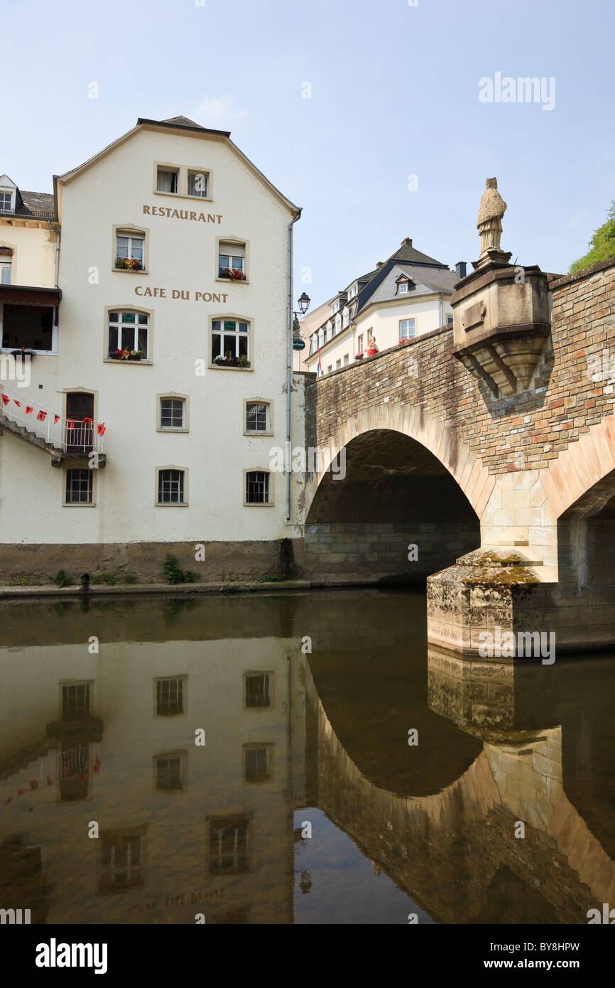Vianden, Grand Duchy of Luxembourg, Europe. Reflections of the bridge over the River Our Stock Photo
