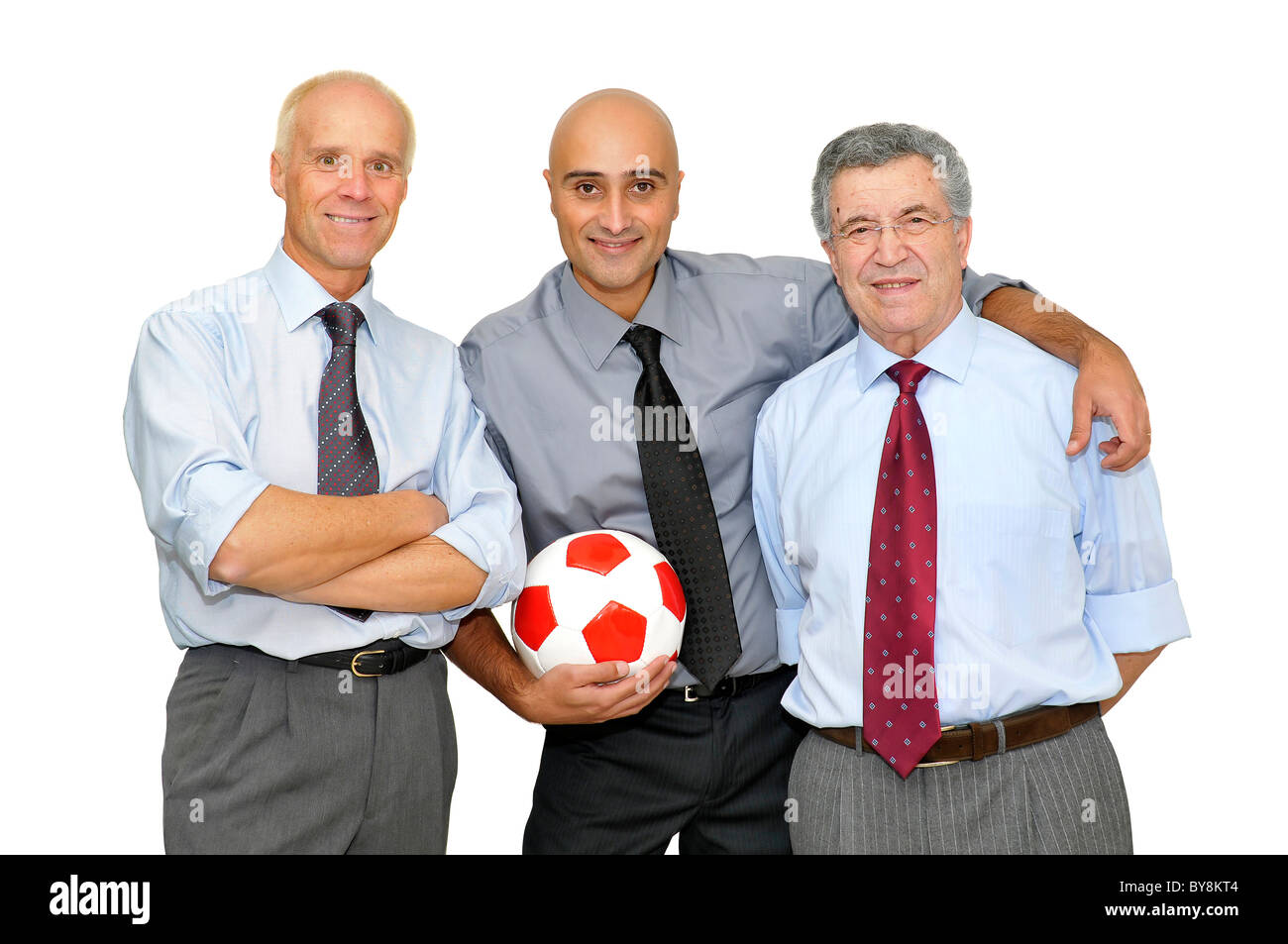 Businessmen with a soccer ball isolated in white Stock Photo - Alamy