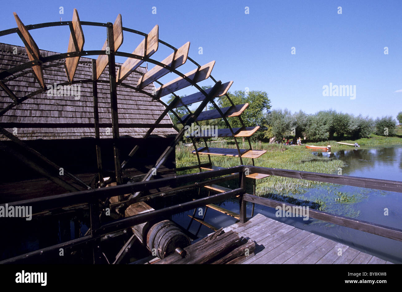 Wooden millwheel at the old flour mill on the river Maly Dunaj in