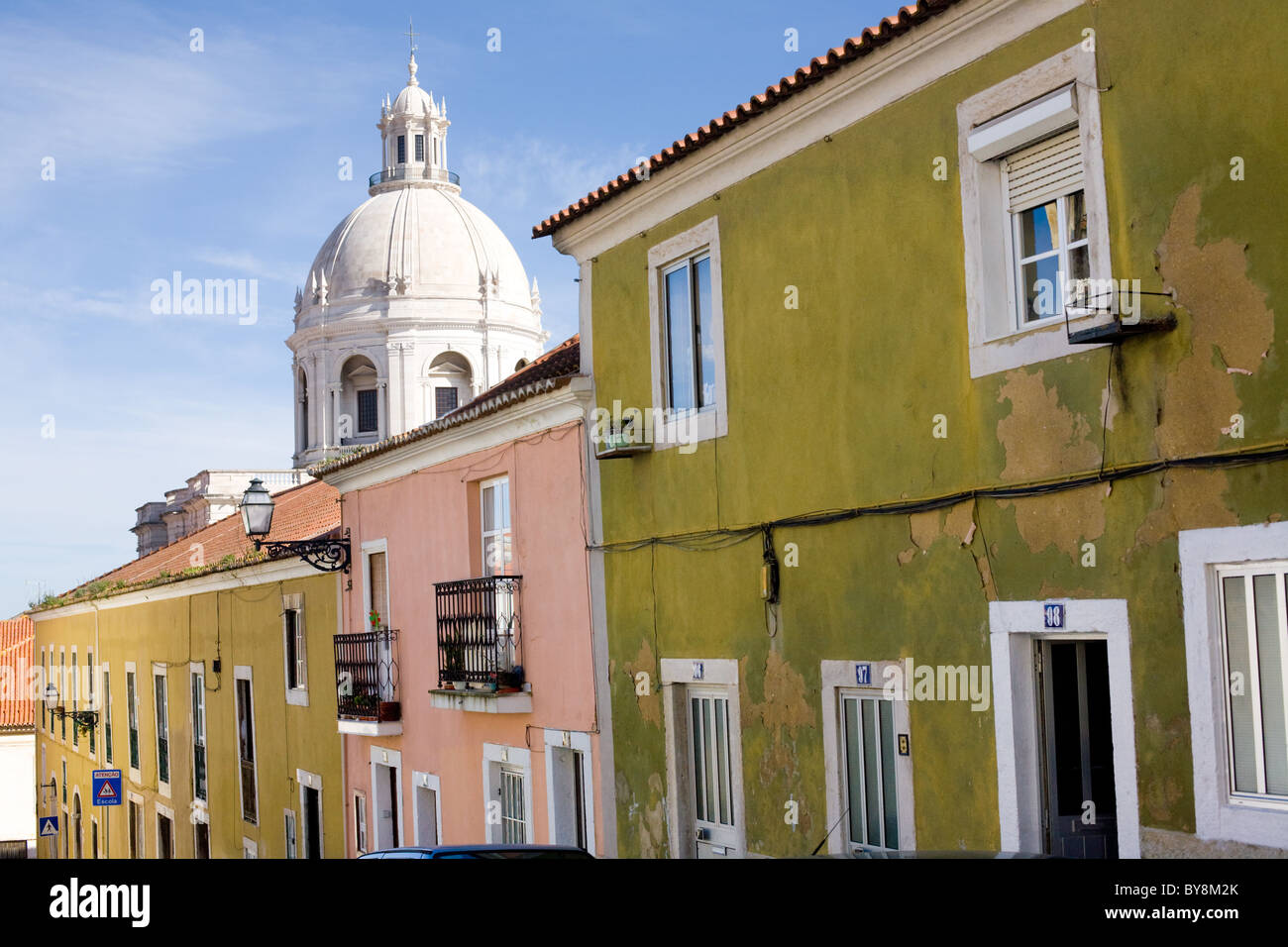Santa Engracia Church aka National Pantheon, behind old homes in Alfama district, Lisbon, Portugal Stock Photo