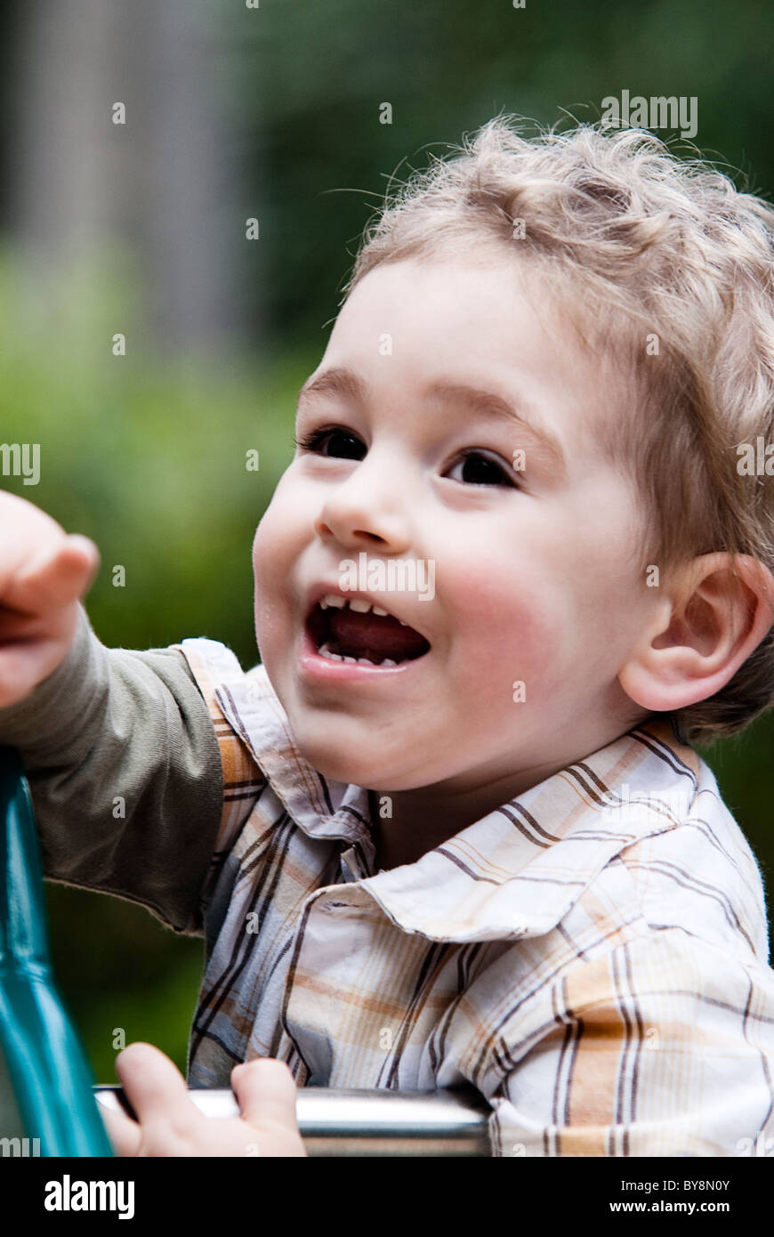 the child points the finger i laugh without looking at camera Stock ...