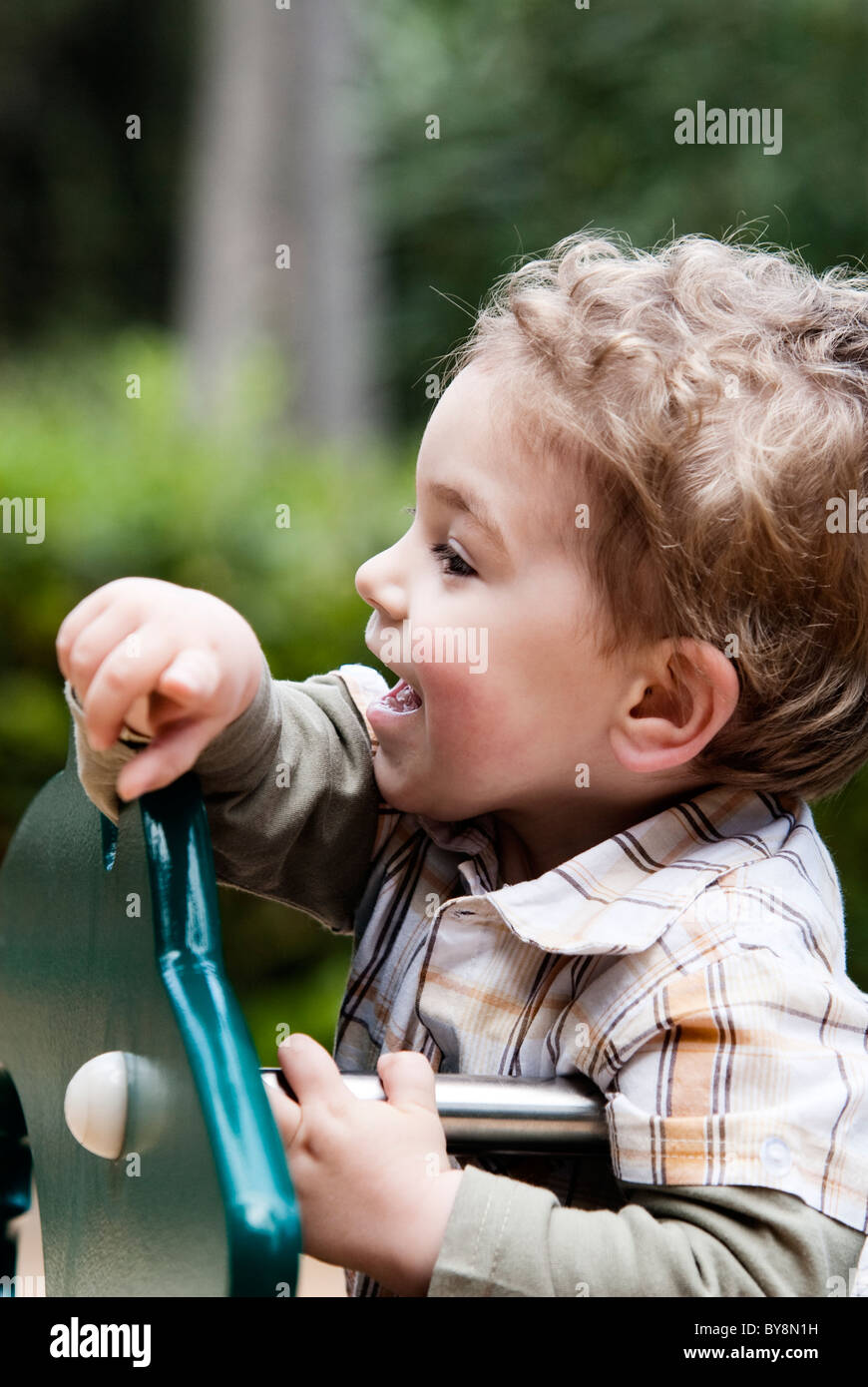 the child points the finger i laugh without looking at camera Stock ...