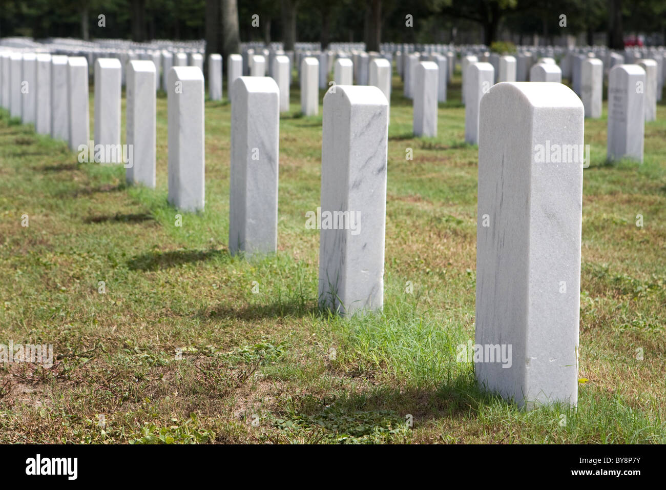 Headstones mark the graves of veterans and their loved ones at Barrancas National Cemetery, Naval Air Station, Pensacola, Florid Stock Photo