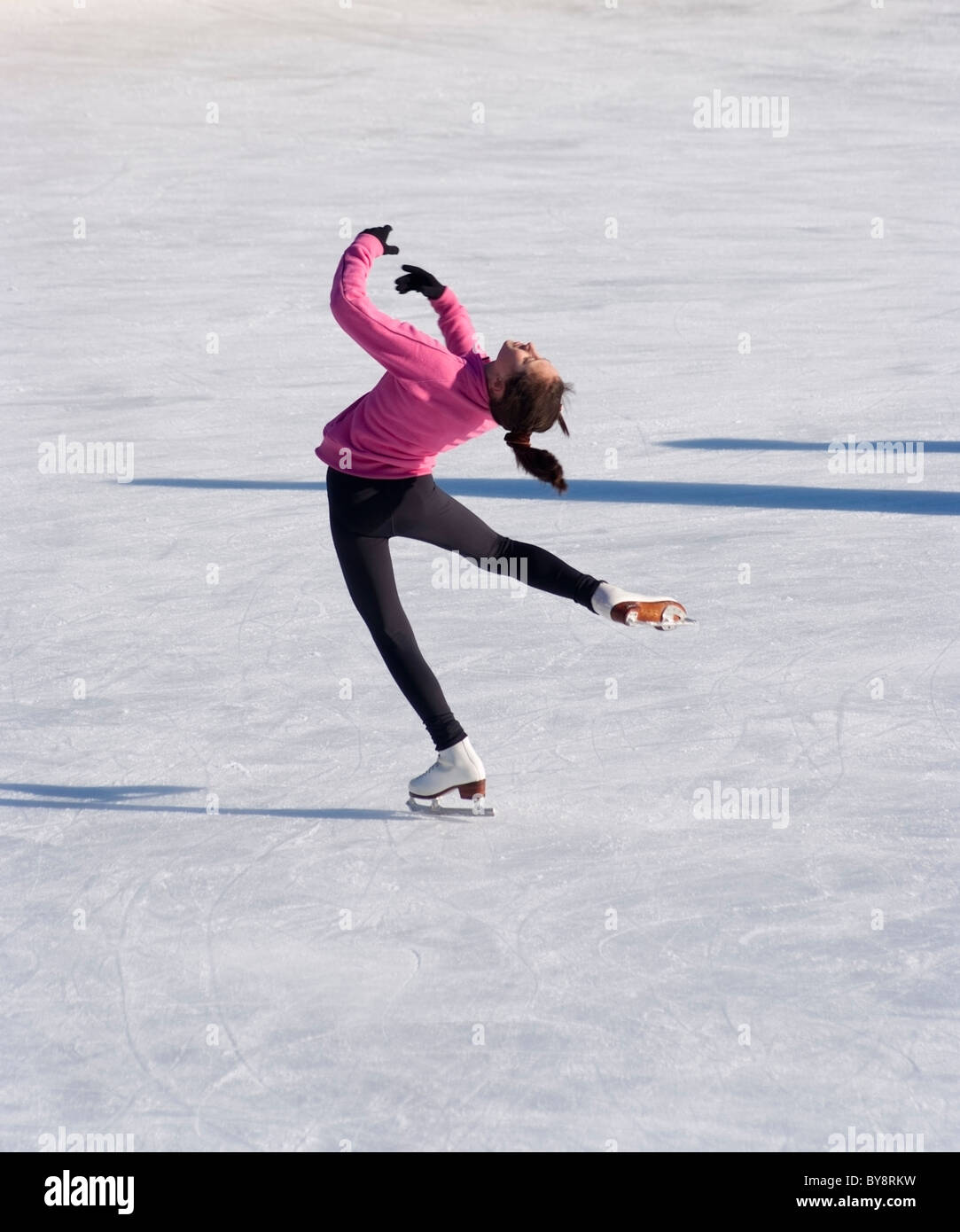 Young female figure skater doing a layback spin at the North Park Ice Skating Rink in Allison Park near Pittsburgh, PA, USA Stock Photo
