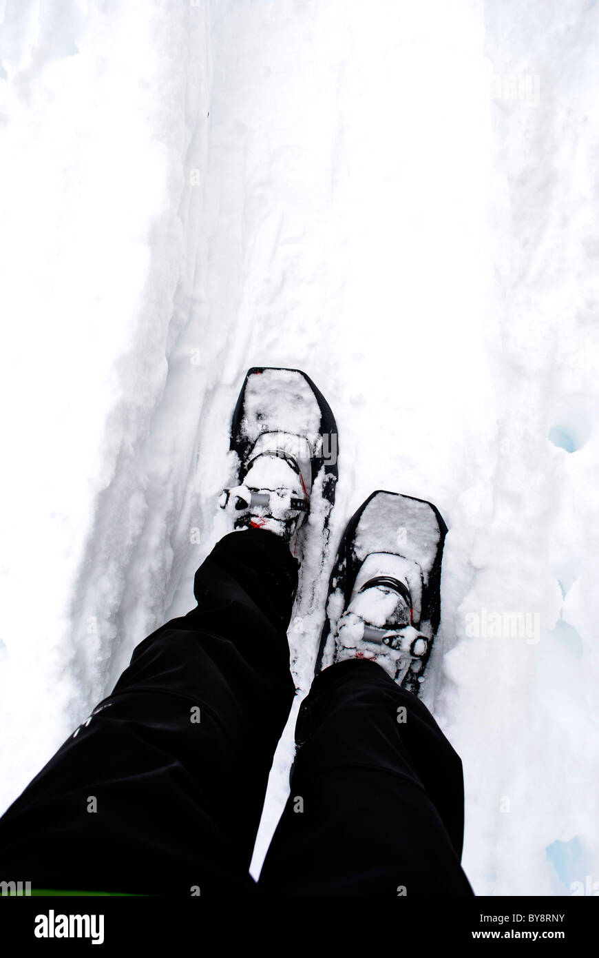 snowshoes to walk in the snow white Stock Photo Alamy