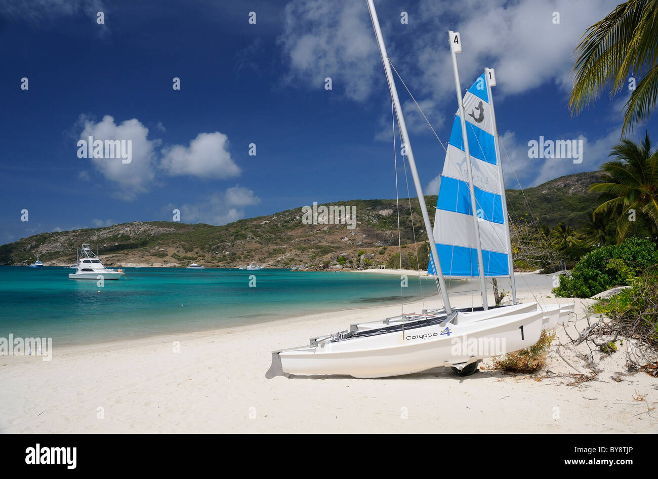Catamarans with blue and white striped sail on Anchor Bay, Lizard Island, Great Barrier Reef, Queensland, Australia Stock Photo