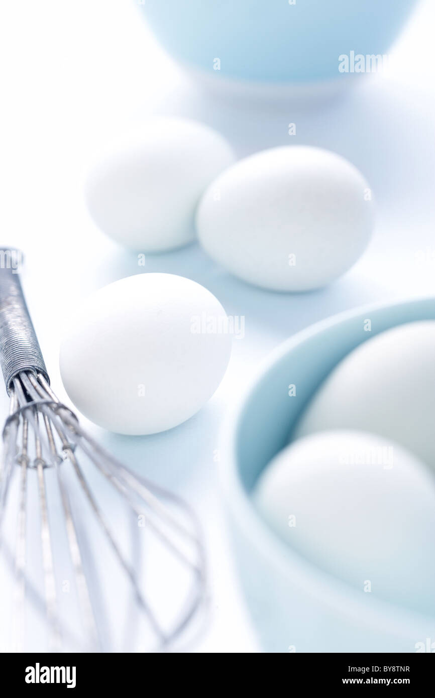 Eggs on blue background Stock Photo