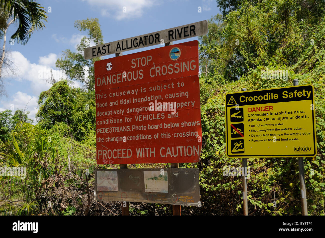 Danger sign before the East Alligator River, Kakadu National Park, Northern Territory, Australia Stock Photo