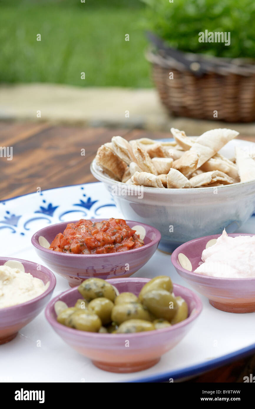 Dips, olives and pitta breads Stock Photo