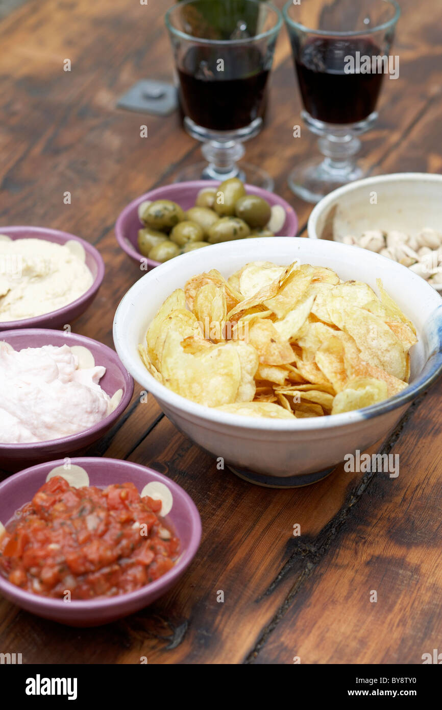 Dips With crisps and red wine Stock Photo