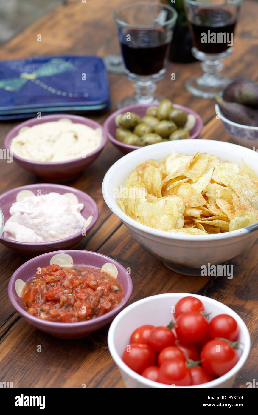 Dips with crisps and red wine Stock Photo