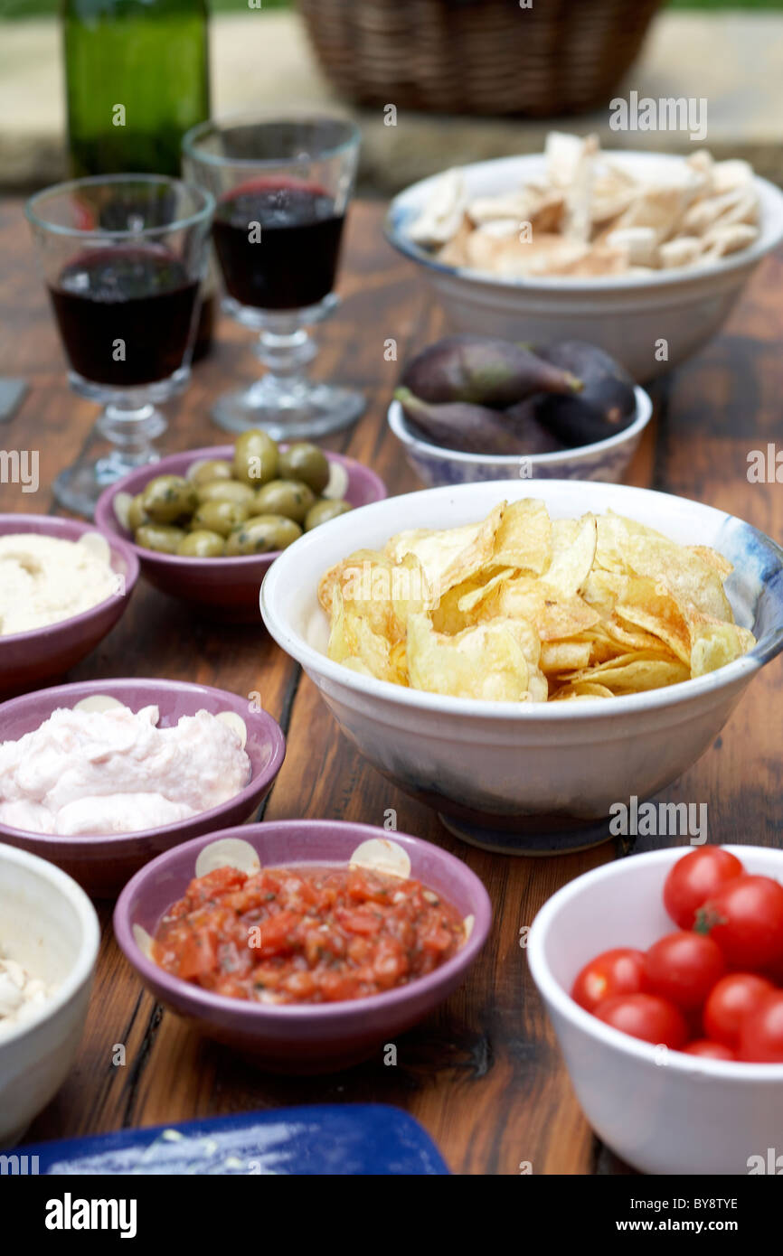 Dips with crisps and red wine Stock Photo