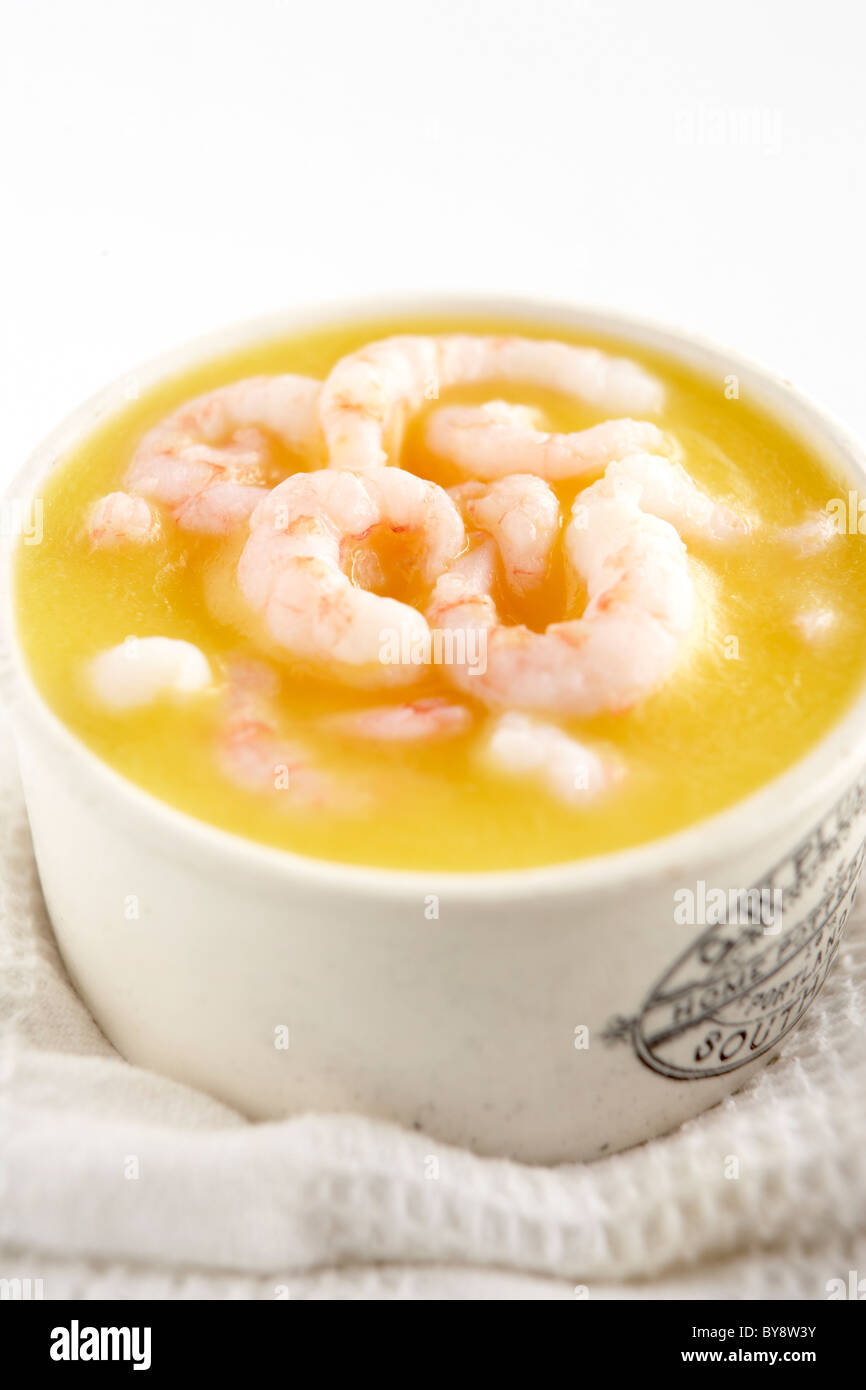 Potted prawns in white dish Stock Photo