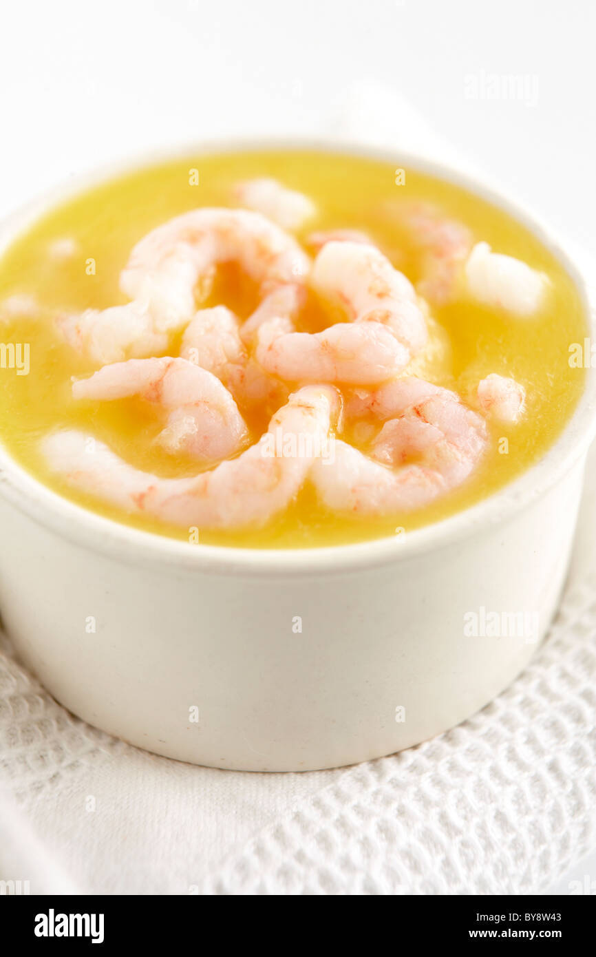 Potted prawns in white dish Stock Photo