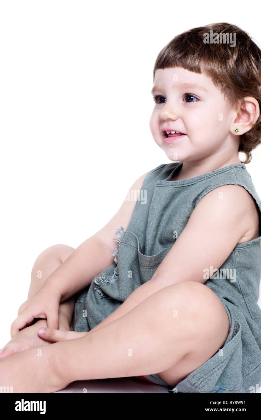 girl sitting with attention and emotion face Stock Photo Alamy